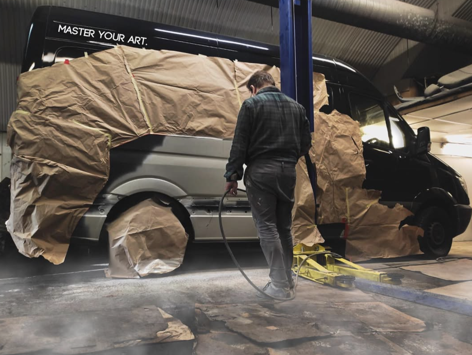 Mercedes Sprinter van masked up for bodywork and repaint at ADE Auto Repairs